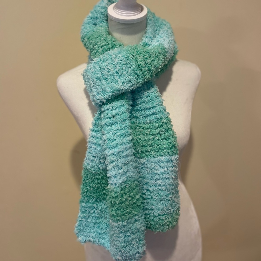 Handmade scarf in gorgeous aqua shades. Super soft and fluffy. Approx 72”x8”